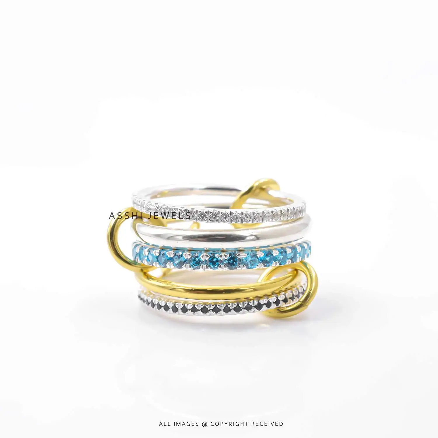 5 Ring Piece Set (White CZ, Blue Topaz and Sapphire with Gold Plated Links) Asshi Jewels